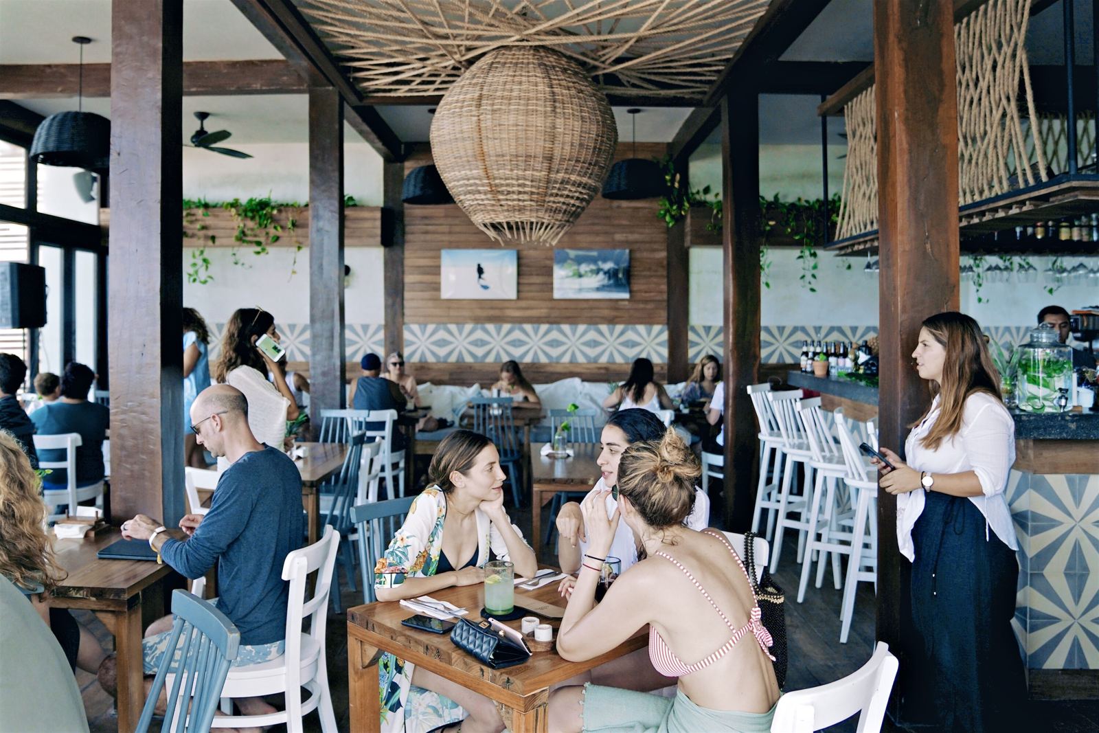 Real Coconut Kitchen dining room full at midday