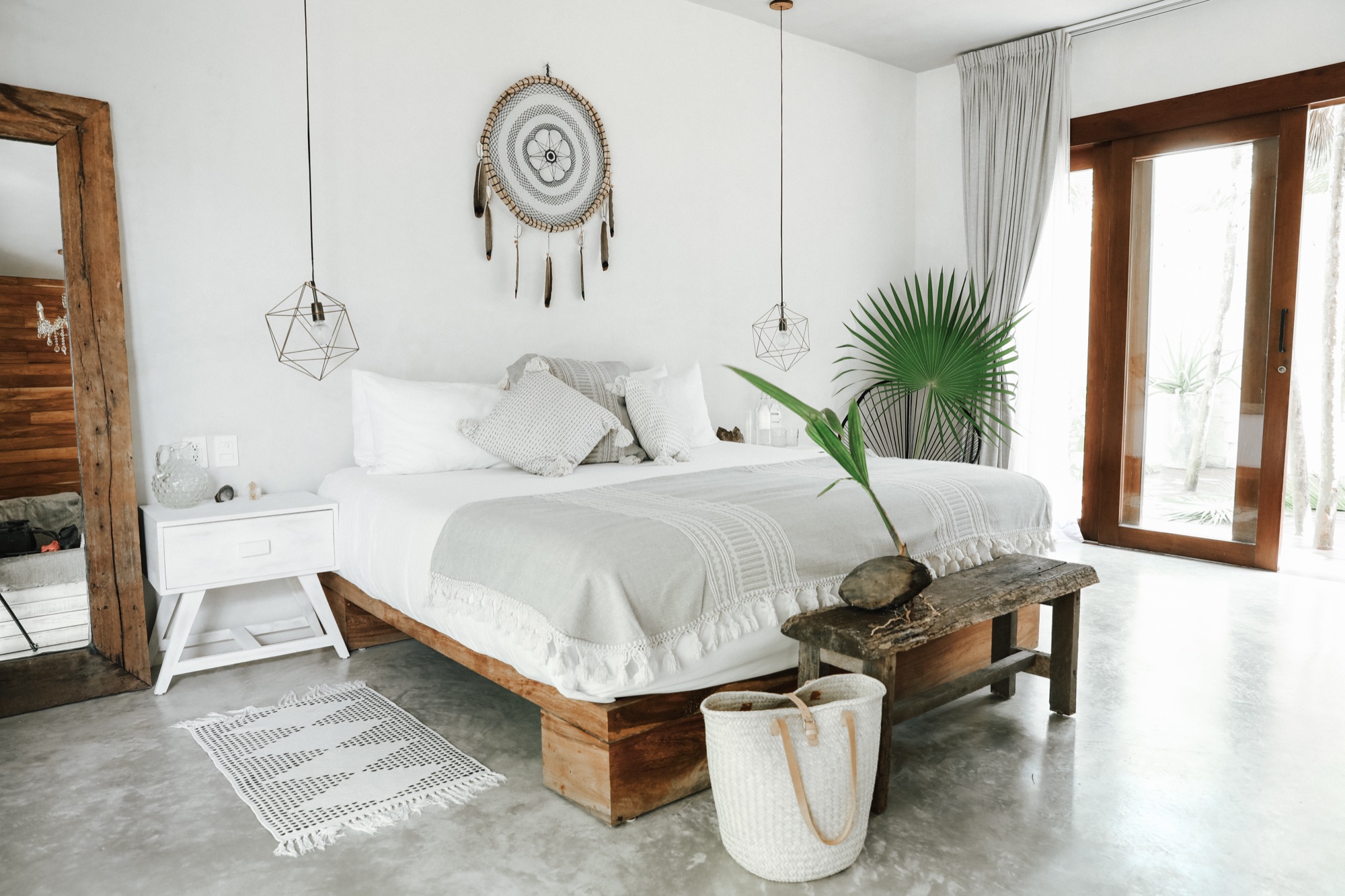 A Ground Floor Beachside Suite, the doors open to the garden