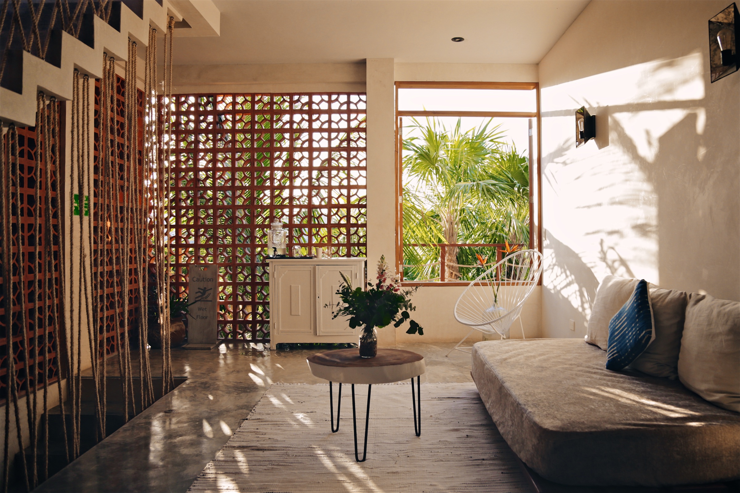 The Wellness Center lounge, the lattice screen and the palms